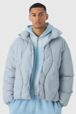 Store boohooMAN Abstract Quilted Funnel Neck Puffer In grey