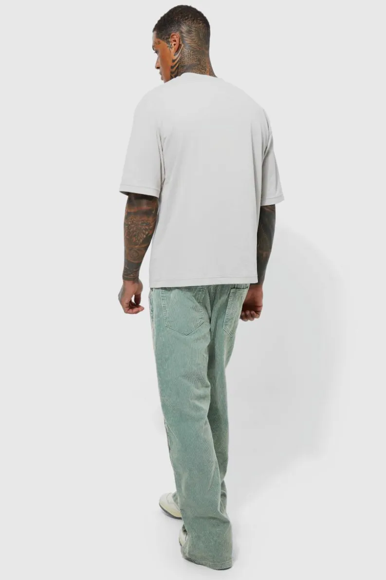 Discount boohooMAN Acid Wash Relaxed Fit Popper Corduroy Trousers sage
