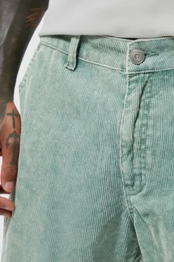 Discount boohooMAN Acid Wash Relaxed Fit Popper Corduroy Trousers sage