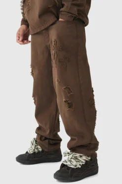 Best boohooMAN Baggy Fit Cross Applique Dirty Wash Jeans brown