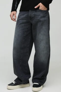 Shop boohooMAN Baggy Fit Rigid Gusset Panel Jeans charcoal