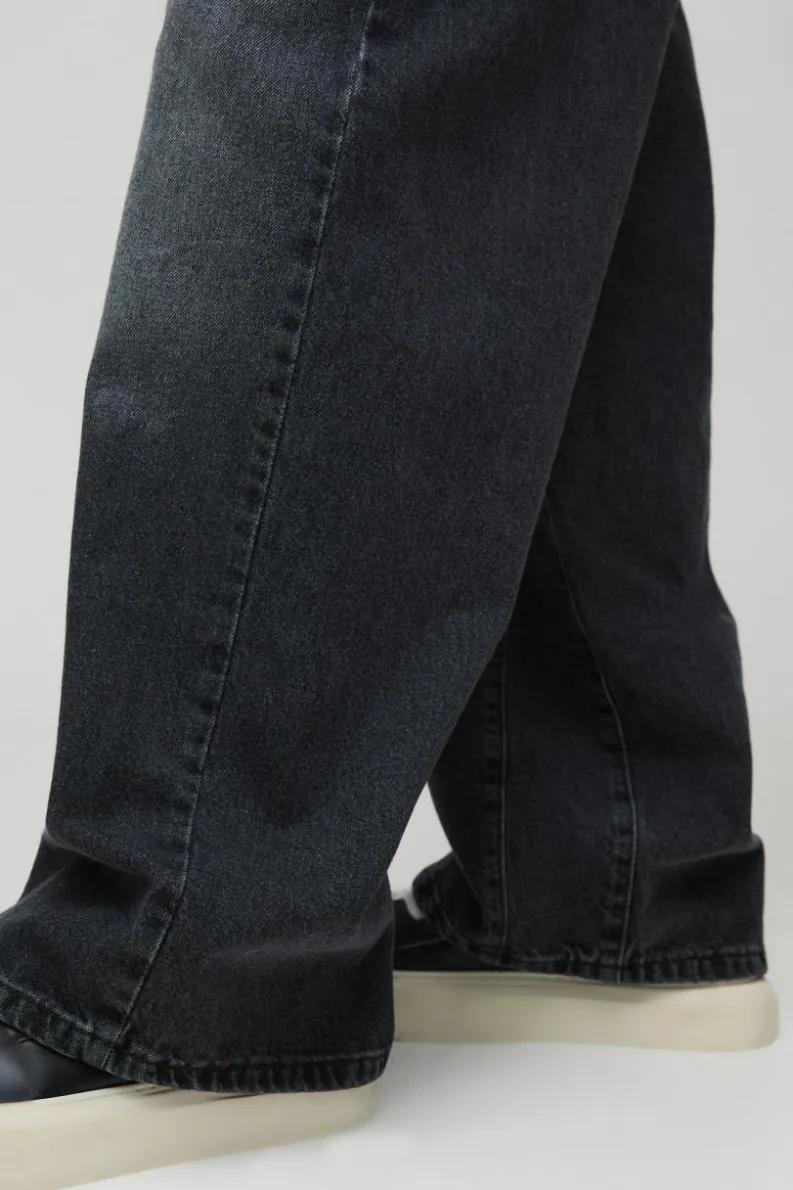 Shop boohooMAN Baggy Fit Rigid Gusset Panel Jeans charcoal