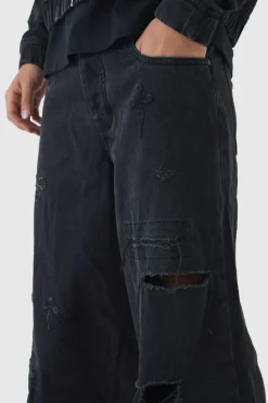 Outlet boohooMAN Baggy Rigid Cross Applique Denim Jeans washed black