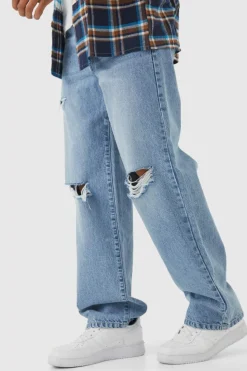 Shop boohooMAN Baggy Rigid Distressed Jeans ice blue