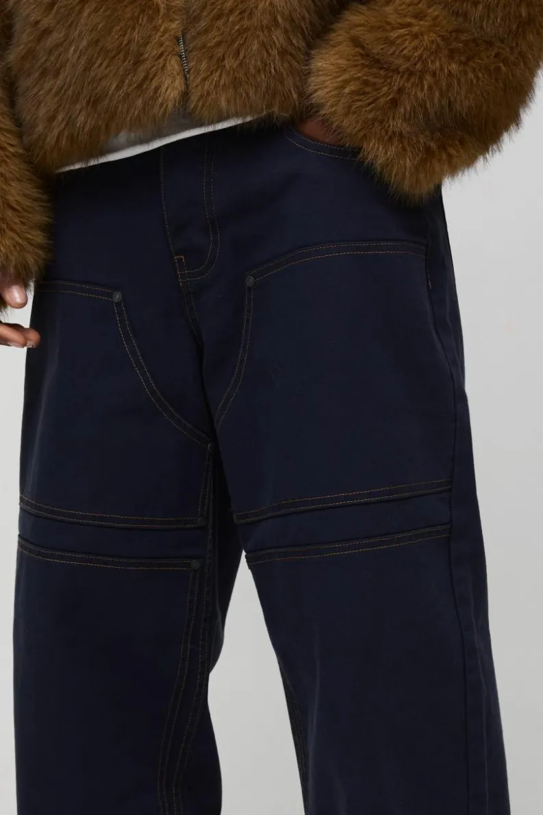 Shop boohooMAN Baggy Twill Contrast Stitch Carpenter Trousers ink