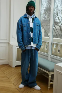 Shop boohooMAN Belted Baggy Fit Jeans light wash