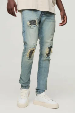 Outlet boohooMAN Biker Rip & Repair Zip Hem Skinny Jeans stonewash