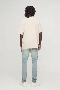 Outlet boohooMAN Biker Rip & Repair Zip Hem Skinny Jeans stonewash
