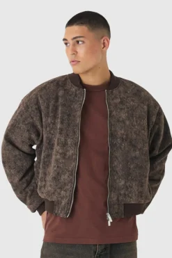 Shop boohooMAN Boxy Acid Wash Bomber Jacket black