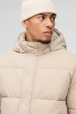 Hot boohooMAN Boxy Crinkle Nylon Puffer In sand