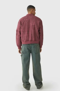 Store boohooMAN Boxy Crinkle Washed Padded Bomber Jacket In red