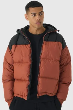 Discount boohooMAN Boxy Curved Quilted Colour Block Hooded Puffer In rust