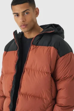 Discount boohooMAN Boxy Curved Quilted Colour Block Hooded Puffer In rust