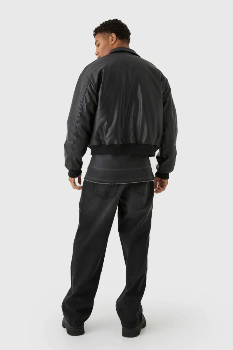 Online boohooMAN Boxy Debossed Collared Pu Bomber Jacket In black