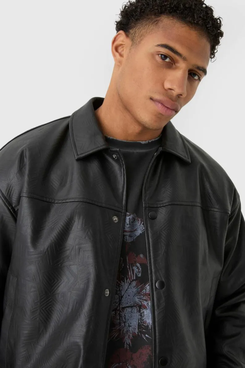 Online boohooMAN Boxy Debossed Collared Pu Bomber Jacket In black