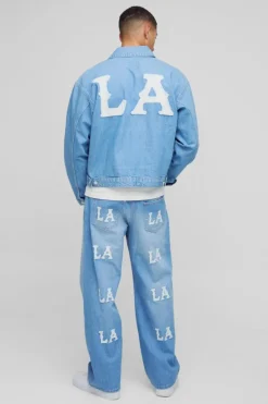Online boohooMAN Boxy Denim LA Applique Denim Jacket light blue