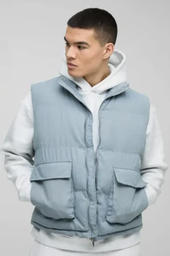 Shop boohooMAN Boxy Faux Suede Funnel Neck Gilet In Blue dusty blue