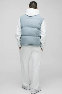Shop boohooMAN Boxy Faux Suede Funnel Neck Gilet In Blue dusty blue