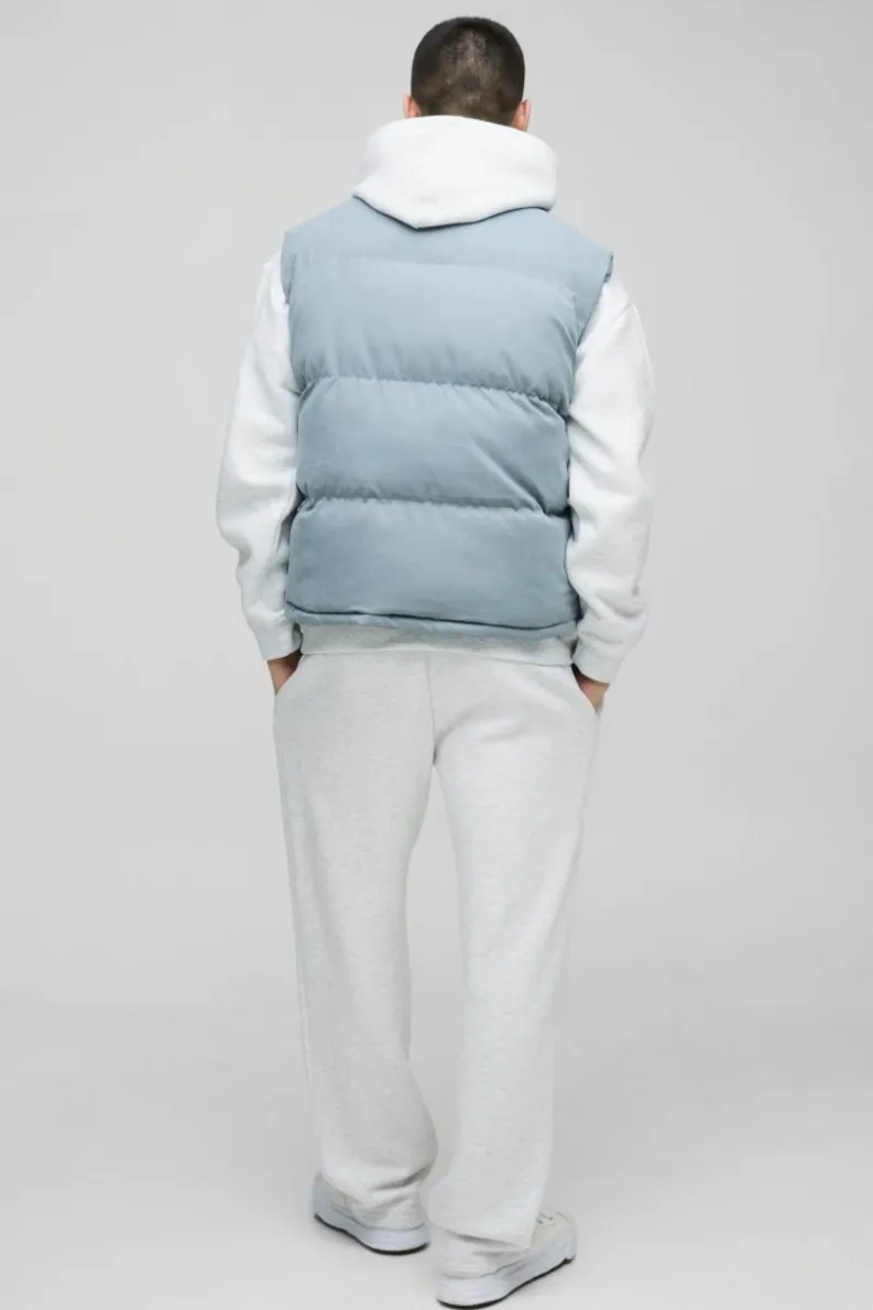 Shop boohooMAN Boxy Faux Suede Funnel Neck Gilet In Blue dusty blue