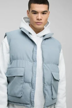 Shop boohooMAN Boxy Faux Suede Funnel Neck Gilet In Blue dusty blue