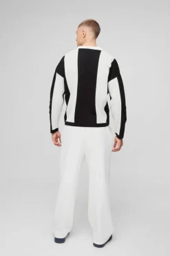 Shop boohooMAN Boxy Moto Stripe Knitted Rugby Polo black