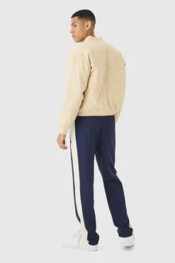 Shop boohooMAN Boxy OFCL Applique Twill Padded Bomber Jacket In stone