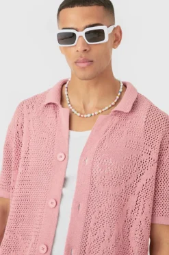 Shop boohooMAN Boxy Oversized Open Stitch Tonal Floral Intarsia Short Sleeve Knit Shirt pink