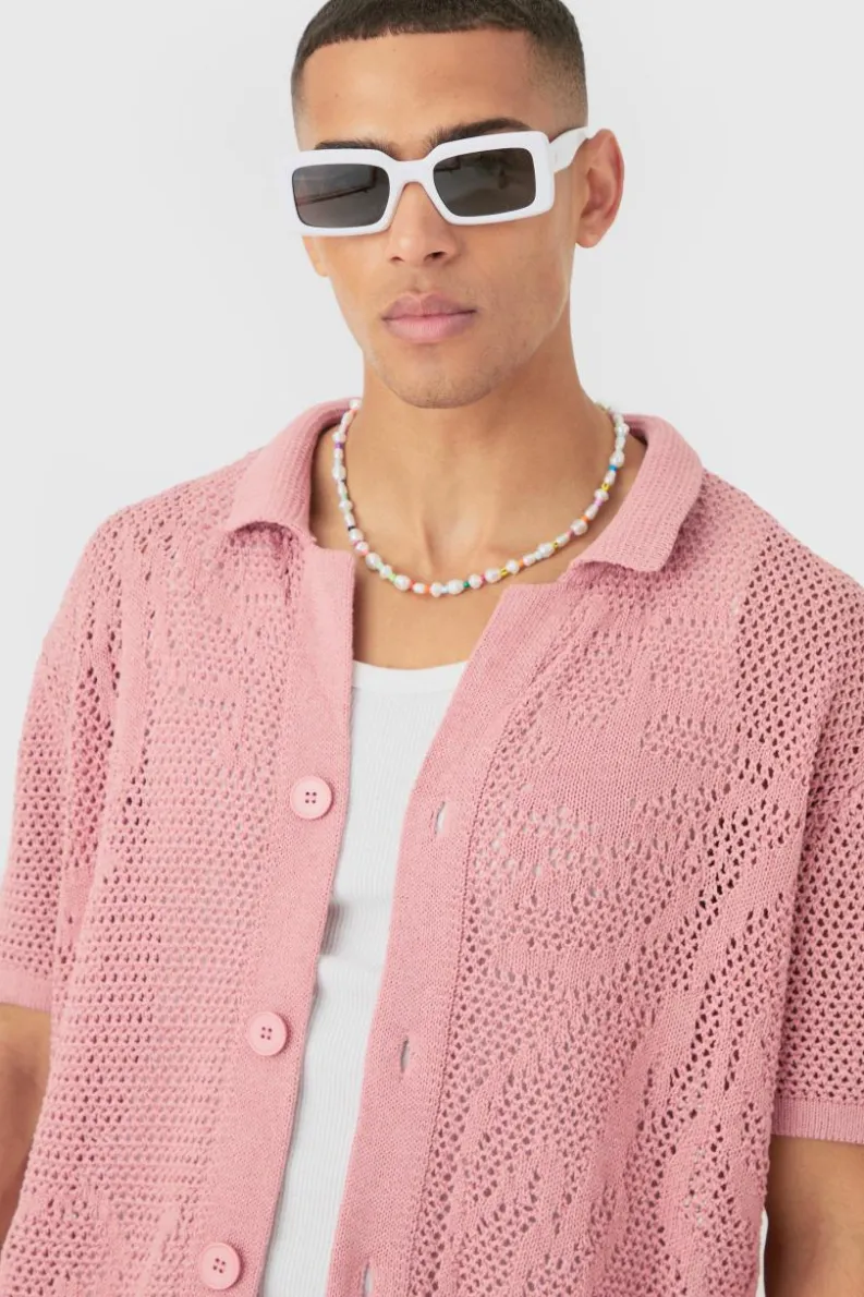 Shop boohooMAN Boxy Oversized Open Stitch Tonal Floral Intarsia Short Sleeve Knit Shirt pink