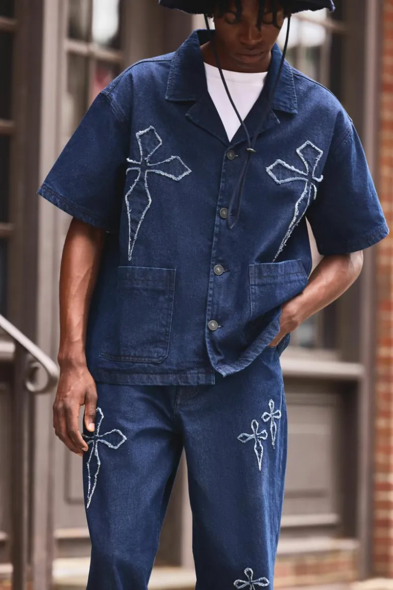 Online boohooMAN Boxy Revere Raw Edge Denim Cross Applique Shirt indigo