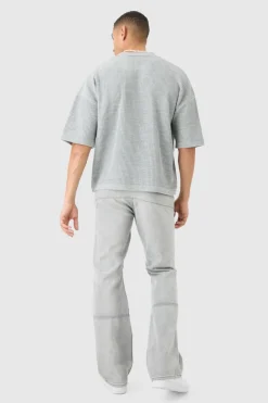 Shop boohooMAN Boxy Short Sleeve Ribbed Knit Polo light grey