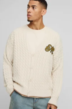 Shop boohooMAN Boxy Varsity Applique Knitted Cardigan ecru