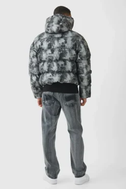 Store boohooMAN Boxy Washed Hooded Puffer Jacket In grey