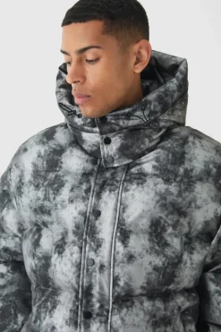 Store boohooMAN Boxy Washed Hooded Puffer Jacket In grey