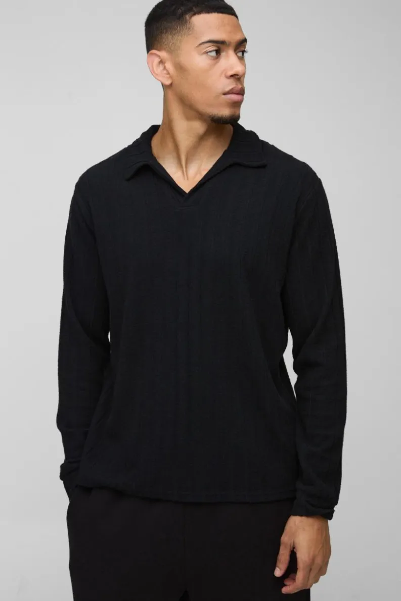 Shop boohooMAN Brushed Wide Rib Revere Long Sleeve Polo black