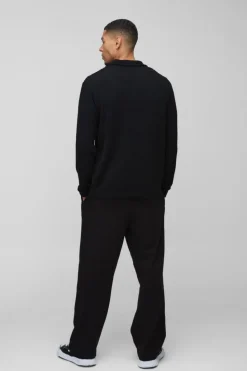 Shop boohooMAN Brushed Wide Rib Revere Long Sleeve Polo black