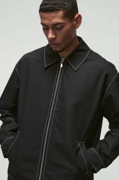 Online boohooMAN Contrast Stitch MAN Tab Bomber Jacket in black