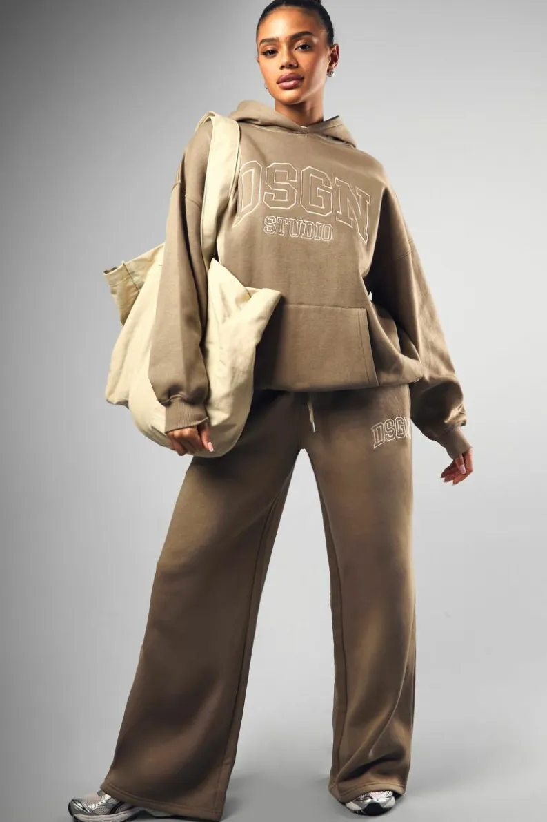 Shop boohoo DSGN Collegiate Embroidered Tracksuit khaki