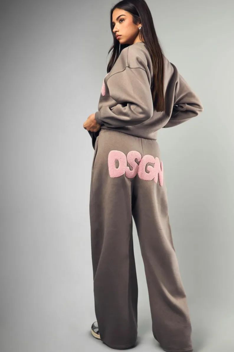 Shop boohoo DSGN Towelling Applique Tracksuit grey