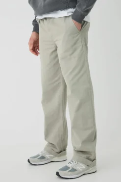 Online boohooMAN Elasticated Waist Baggy Turn Up Hem Chino Trousers light khaki