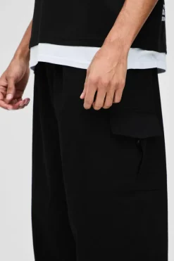 Sale boohooMAN Elasticated Waist Parachute Cargo Trousers black