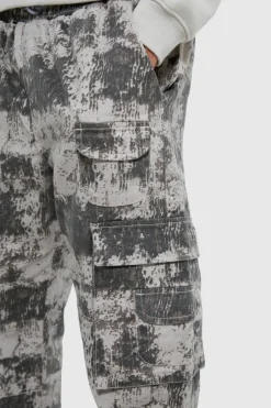Shop boohooMAN Elasticated Waist Printed Pocket Stacked Cargo Trousers multi