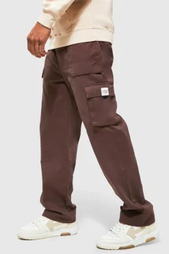 Shop boohooMAN Elasticated Waist Relaxed Fit Buckle Cargo Trouser chocolate