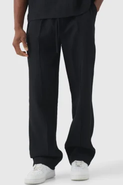 Store boohooMAN Elasticated Waist Relaxed Fit Pleated Trouser black