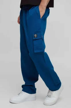 Fashion boohooMAN Elasticated Waist Skate Cropped Woven Tab Trousers teal