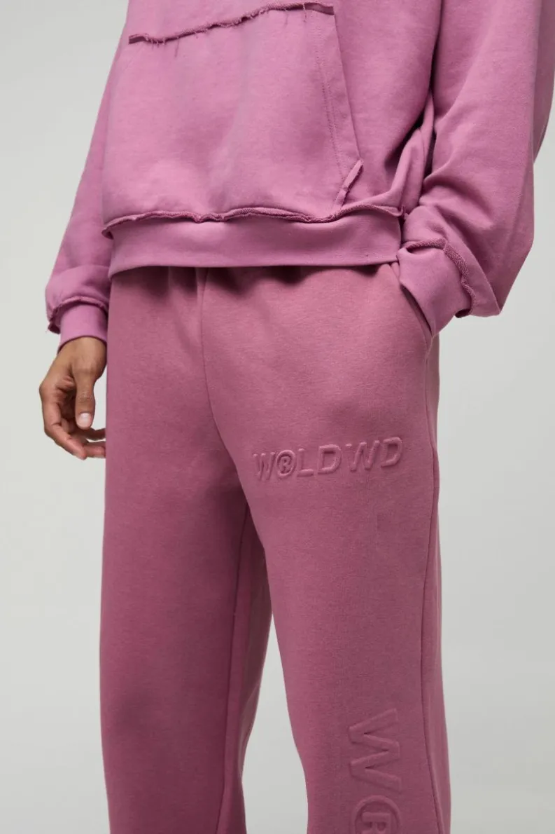 Store boohooMAN Embossed Worldwide Wide Leg Jogger mauve