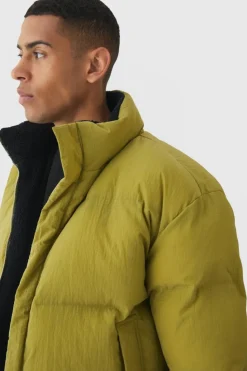 New boohooMAN Embroidered Ripstop Funnel Neck Puffer In olive