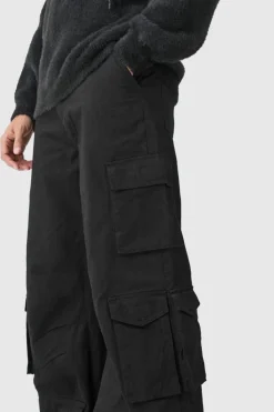 Shop boohooMAN Extreme Baggy Rigid Multi Cargo Pocket Trousers black