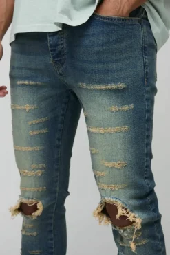 Cheap boohooMAN Extreme Rip Busted Knee Skinny Jeans mid wash