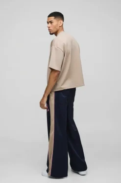 Online boohooMAN Extreme Wide Leg Graphic Tricot Joggers navy
