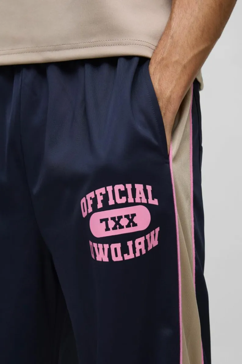 Online boohooMAN Extreme Wide Leg Graphic Tricot Joggers navy